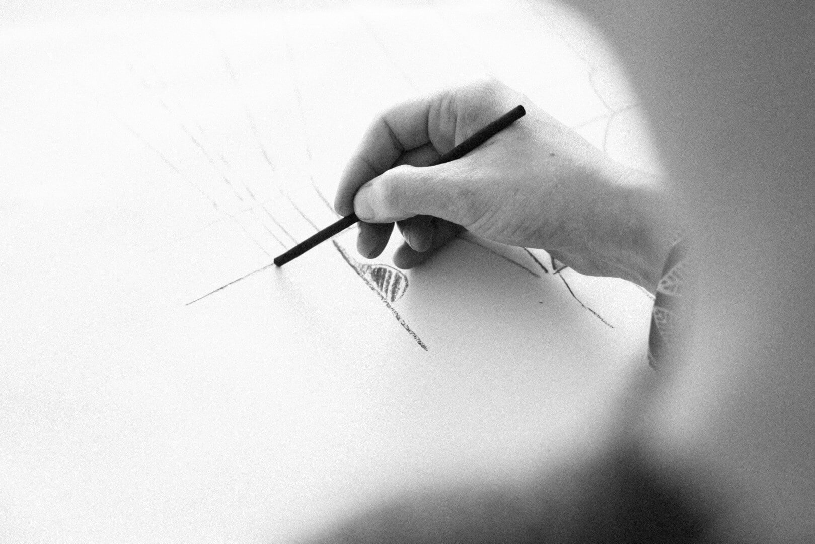 person-sketching-on-white-surface-3621590